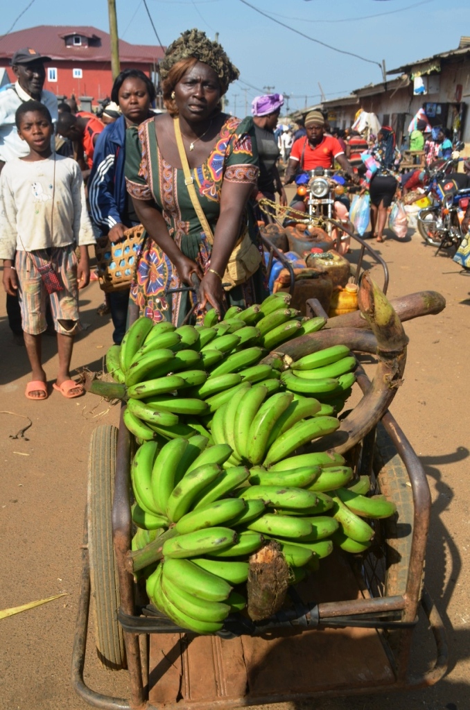 women_farmer_at_market.JPG